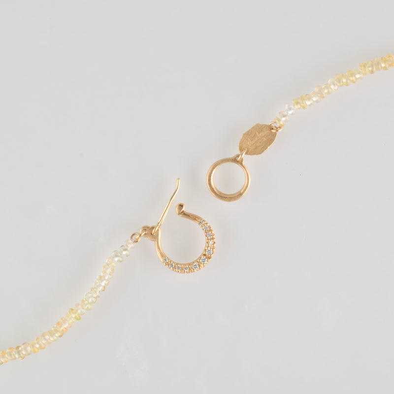 hung diamond clasp yellow sapphire necklace