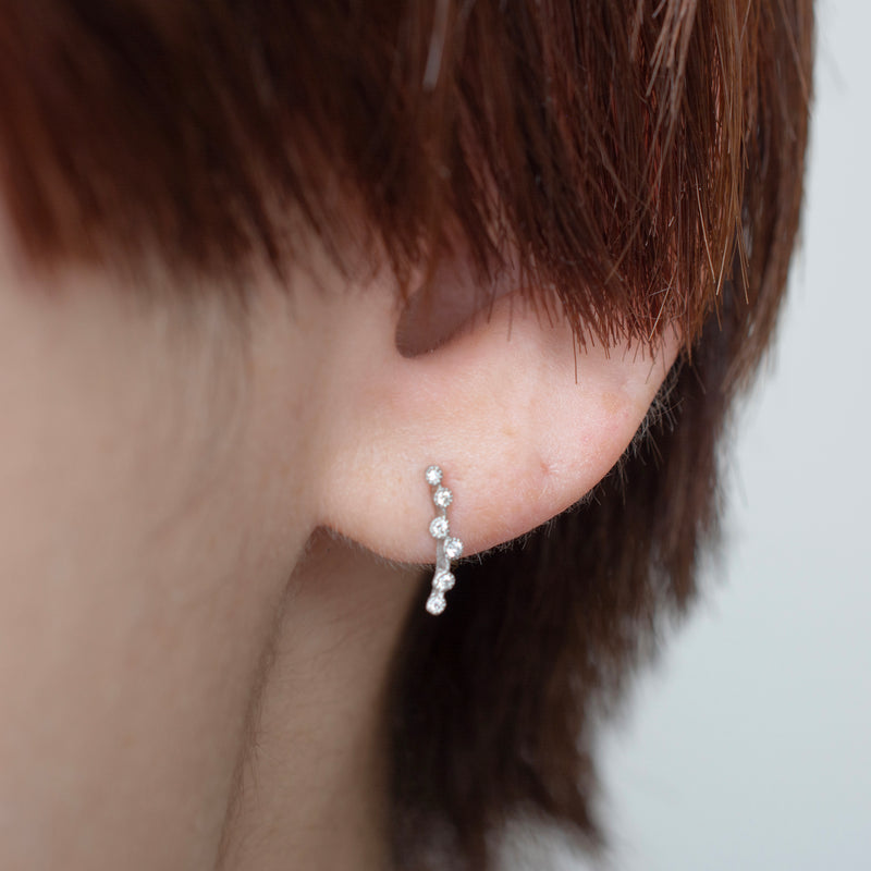 spread diamond stud earrings